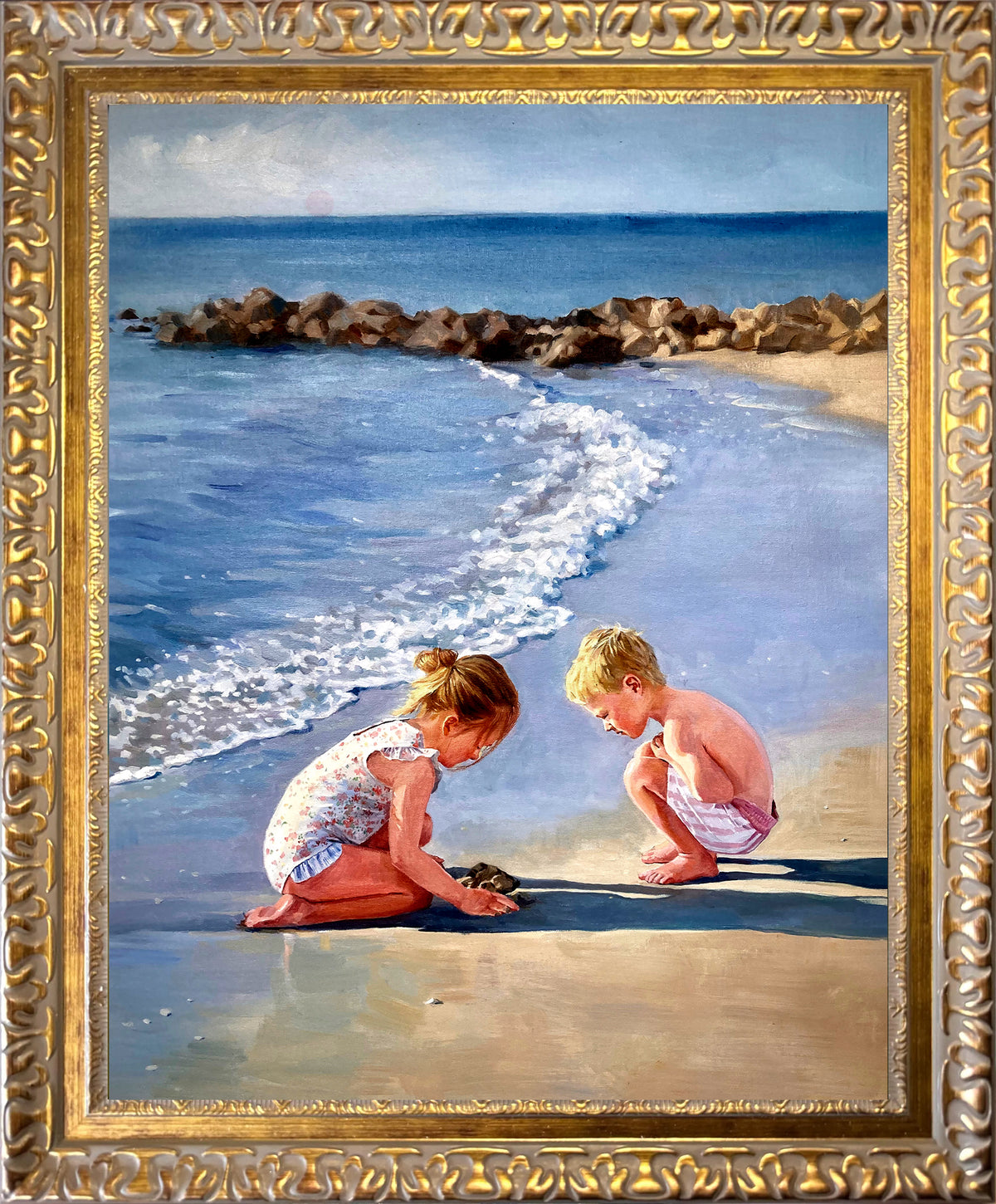 Custom hand-painted oil portrait of two children playing together on a beach, recreated from a family photo with ocean waves and a sunny coastal background.