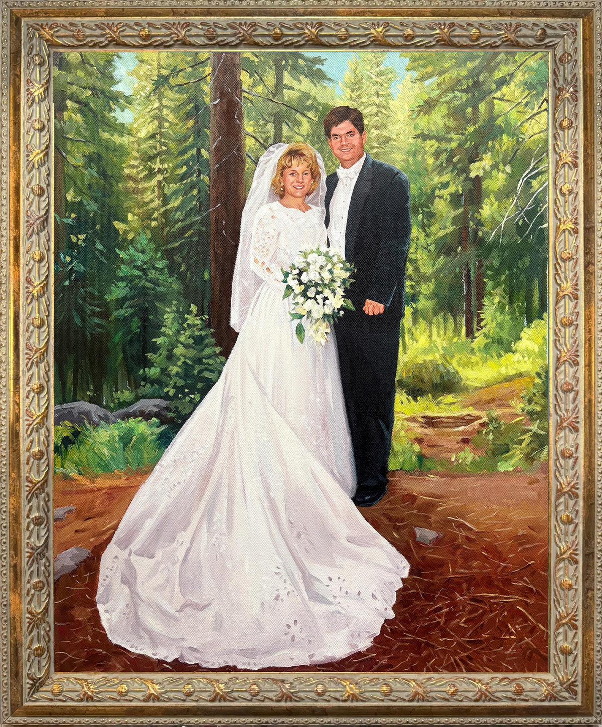 Custom hand-painted wedding oil portrait from a photo, featuring a bride and groom in formal wedding attire surrounded by a sunlit forest, displayed in an ornate gold frame.